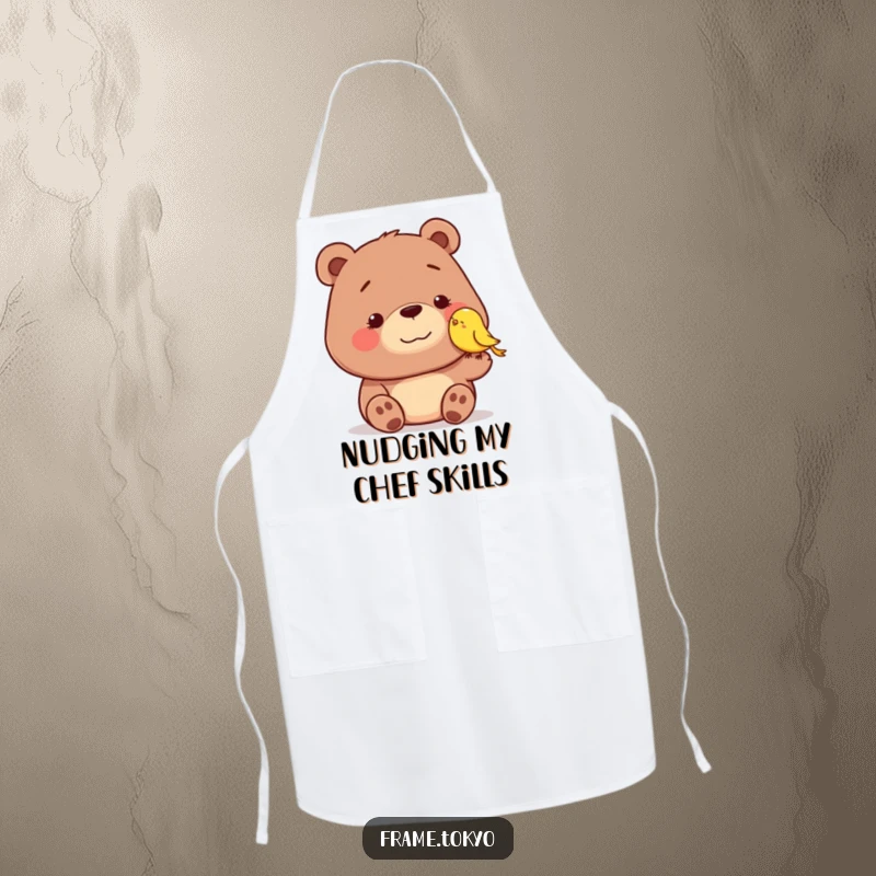 Funny apron with a dopey-smiling bear being nudged by a tiny, smiling bird, perfect for a humorous and charming kitchen experience.