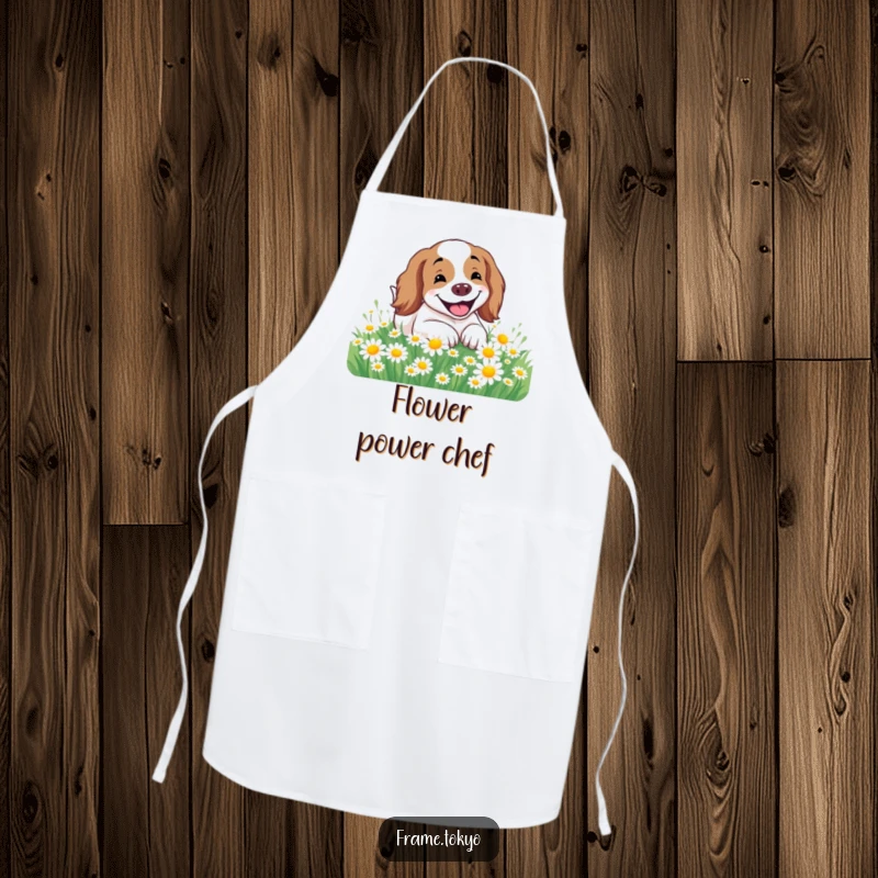 Funny Spaniel Apron featuring a spaniel with a wide smile rolling happily in a field of daisies, perfect for kitchen cheer.
