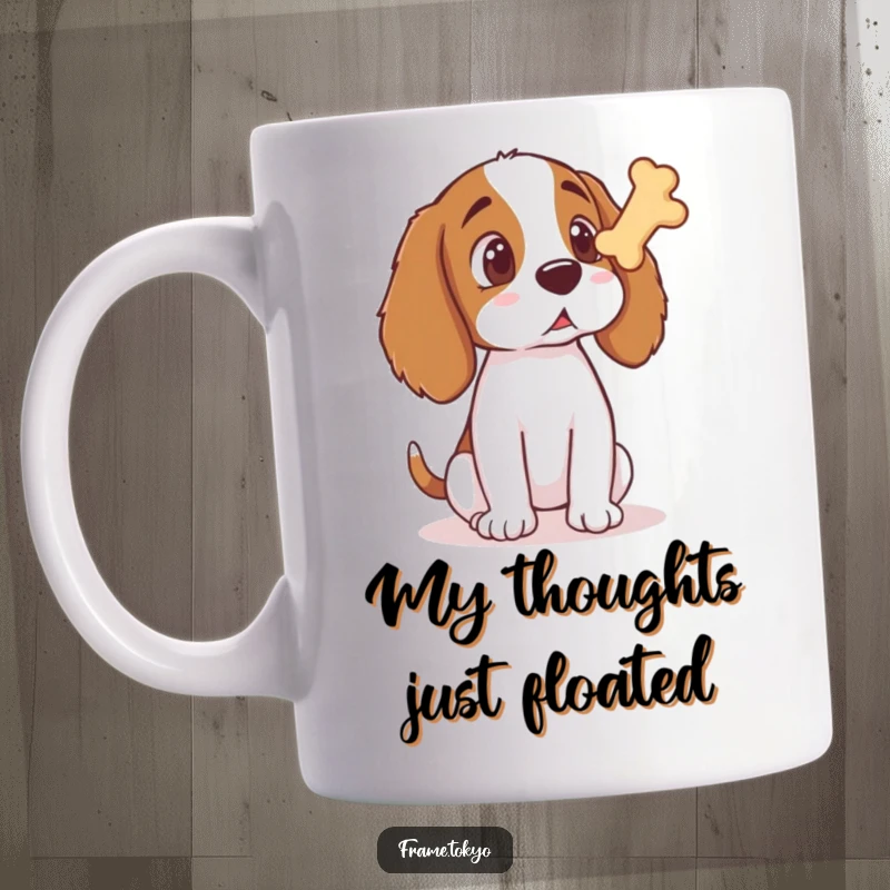 Funny Spaniel Mug featuring a cartoon spaniel with wide, surprised eyes staring at a floating dog bone treat in mid-air.