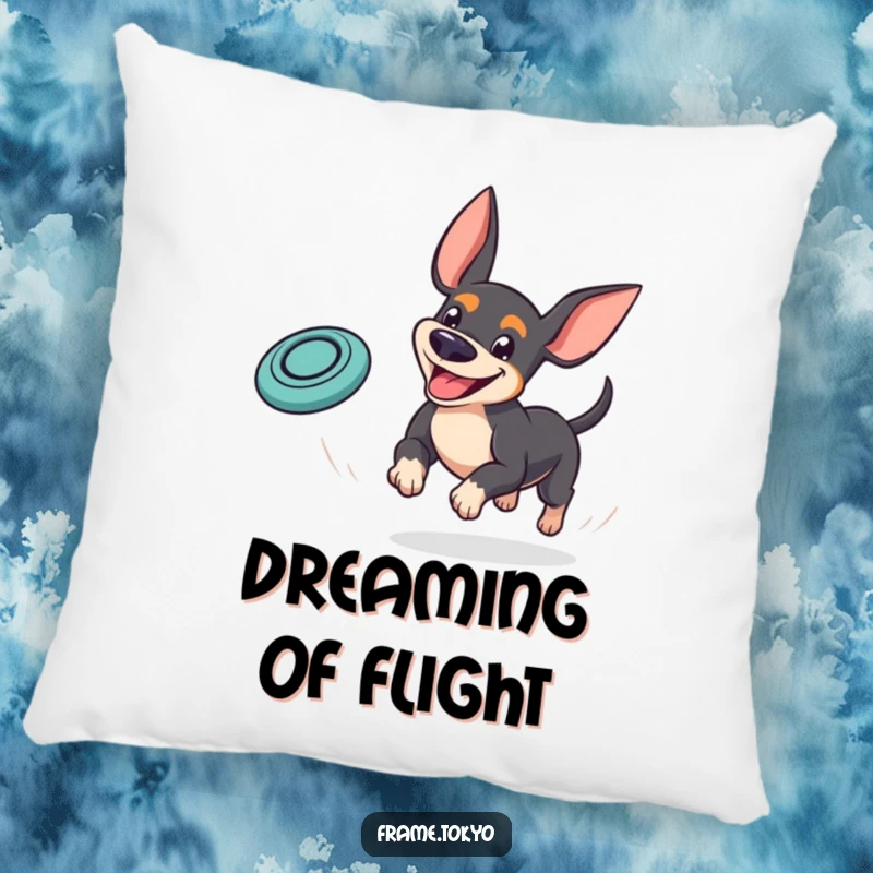 Funny pinscher pillow showcasing a dog with a goofy grin playfully chasing a bouncing mini frisbee, embodying pure playtime fun.