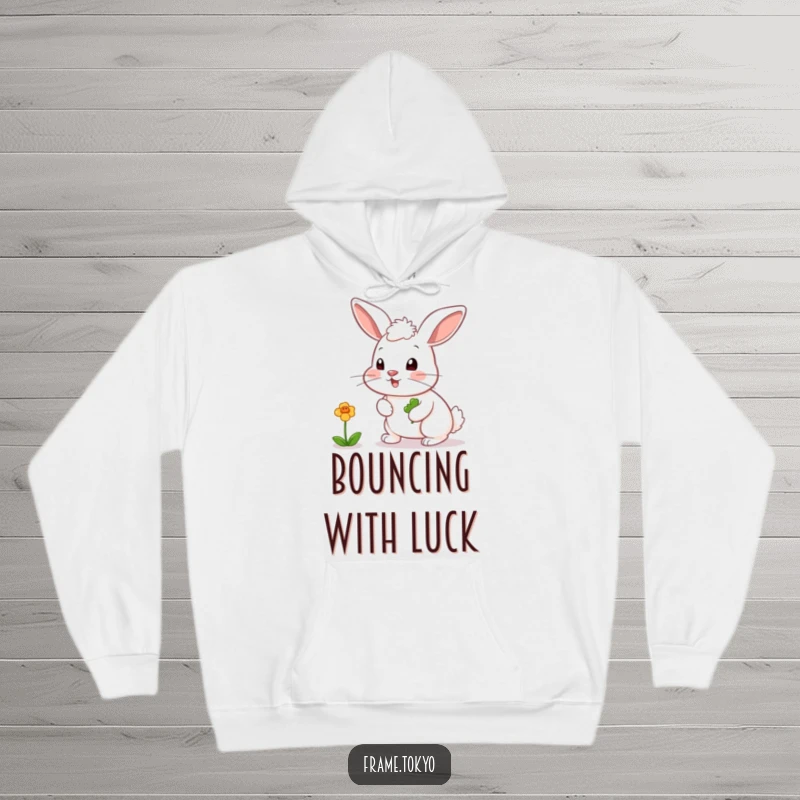 Funny hoodie featuring a rabbit with a playfully twitching nose, in pursuit of a bouncing, colorful clover.