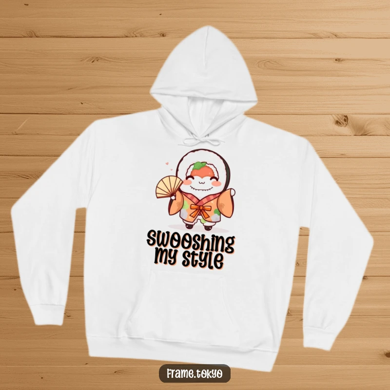 Funny sushi roll wearing a traditional kimono, cheerfully waving a fan, depicted on a comfortable hoodie.