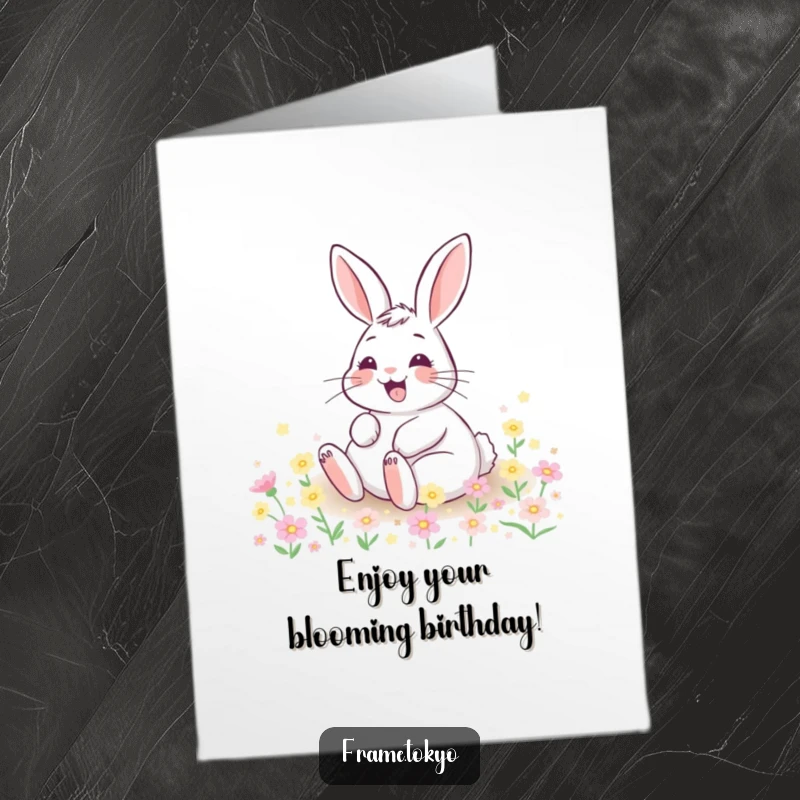 Funny Free Printable Birthday Card: A happy rabbit with a wide grin rolls joyfully amidst tiny, glowing flowers, spreading cheer.