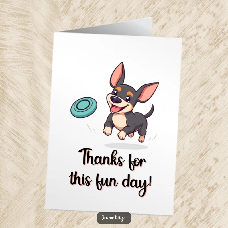 Funny Free Printable Pinscher Thank You Card: A Pinscher with a wide, goofy grin chasing a bouncy frisbee.