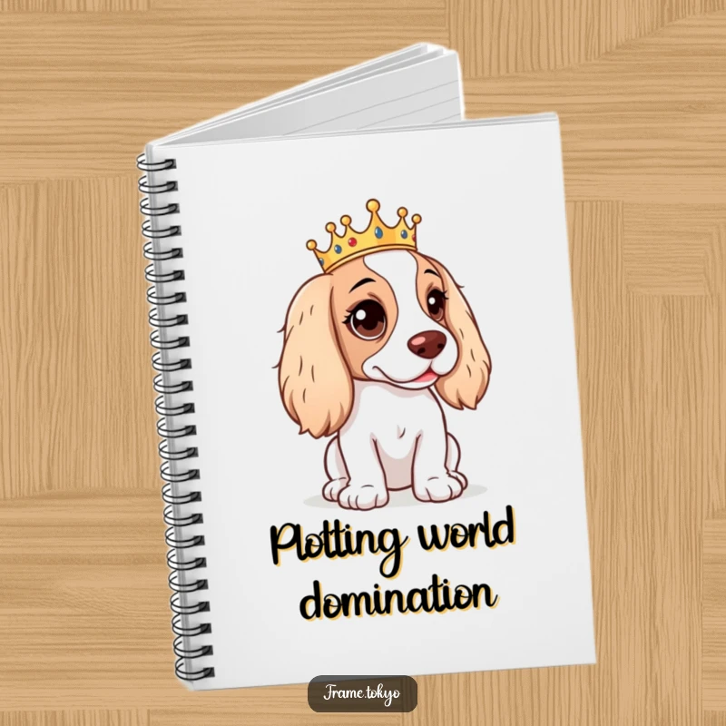 Funny Spaniel Notebook cover showing a spaniel with a mischievous glint, wearing a tiny crown, for jotting notes.