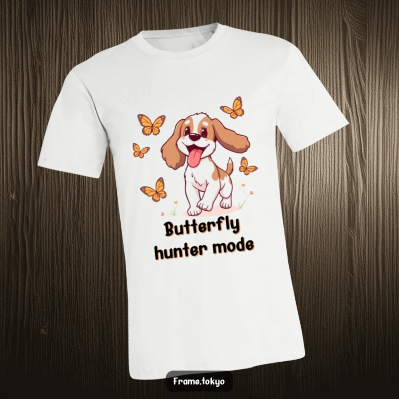 Funny Spaniel T-Shirt depicting a spaniel with its tongue hanging out joyfully while chasing whimsical animated butterflies.