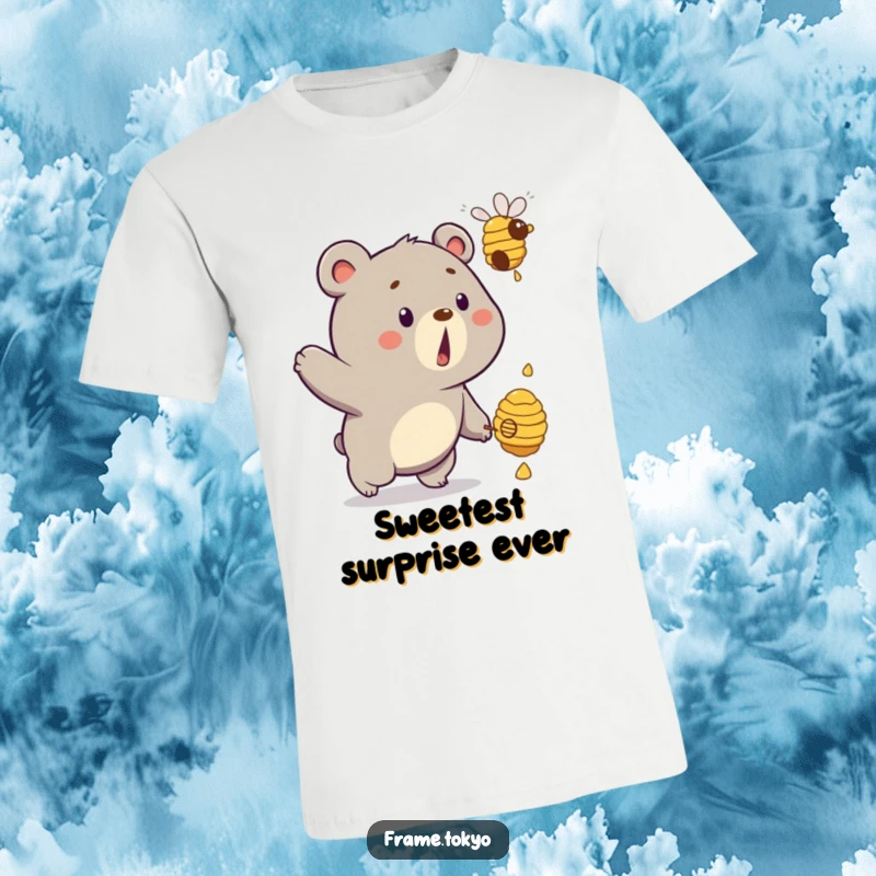 Funny bear t-shirt showing a surprised bear with an open mouth, hilariously chasing a dripping beehive floating just out of reach.