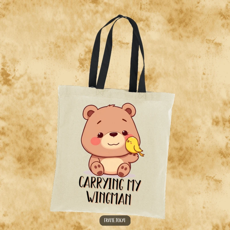 Funny tote bag with a dopey-smiling bear being nudged by a tiny, smiling bird, perfect for carrying groceries with a humorous touch.