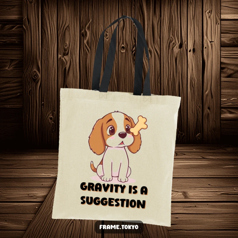 Funny Spaniel Tote Bag depicting a spaniel's wide-eyed astonishment upon seeing a bone treat magically float towards it.
